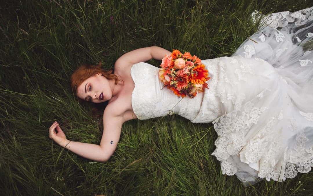 outdoor wedding bride rock chick autumnal orange photography Katie Mortimore